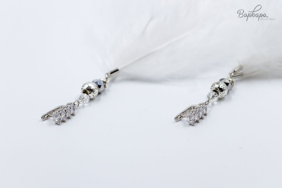 Серьги с перьями