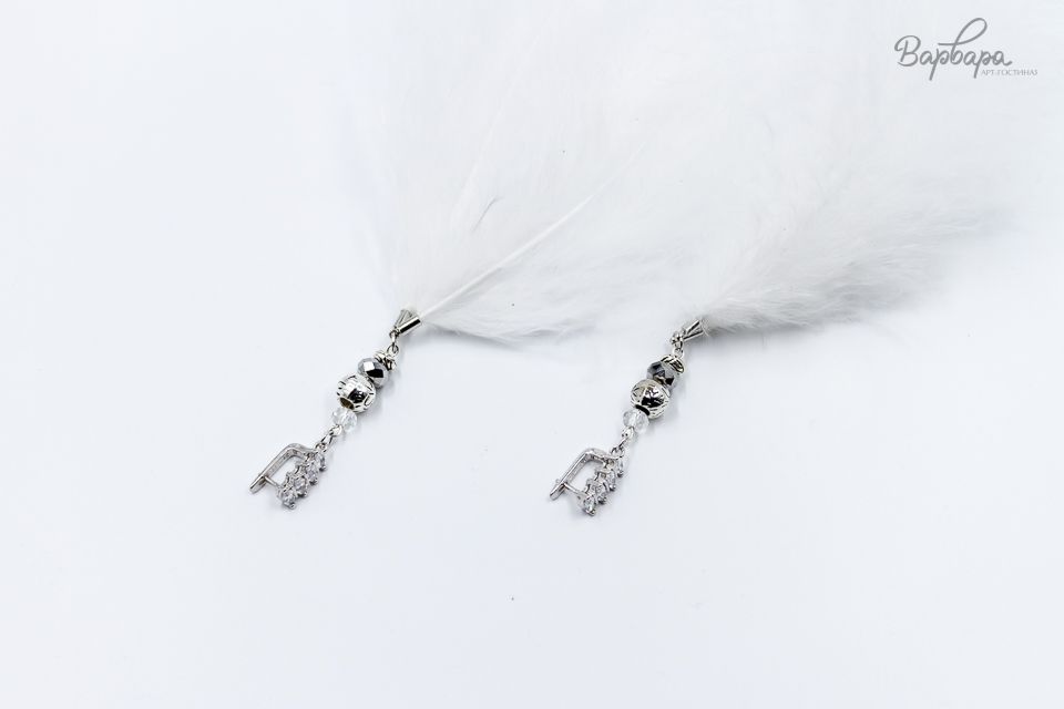 Серьги с перьями